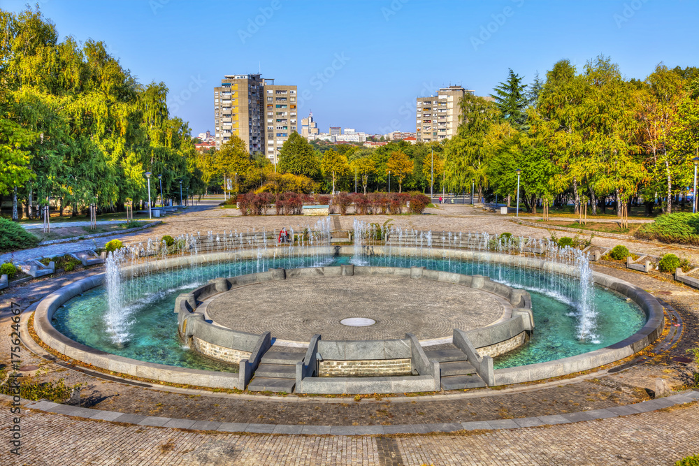A large circular fountain in front of the Museum of Yugoslavia, HDR image.