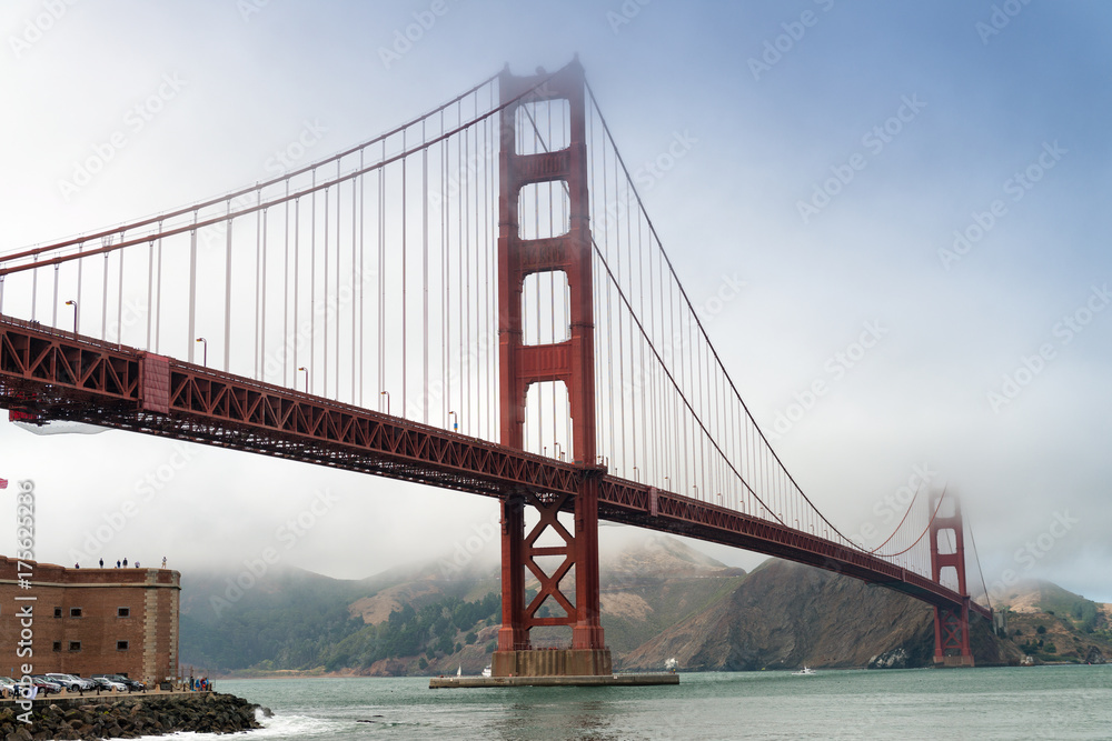 San Francisco Golden Gate Bridge on a foggy day from Fort Point