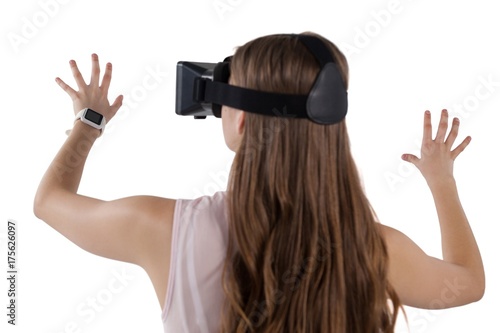 Teenage girl using virtual reality headset