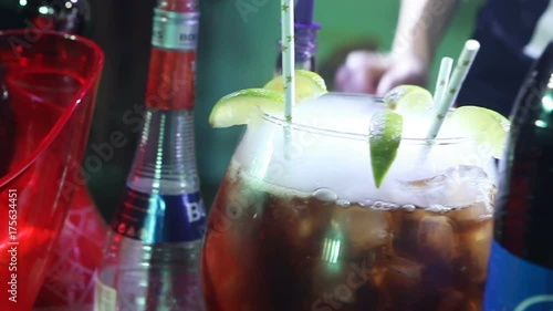 Close up shot, of a cocktail with a smoke molecular cocktail glass in a bar, preparing cocktail, close up, hands