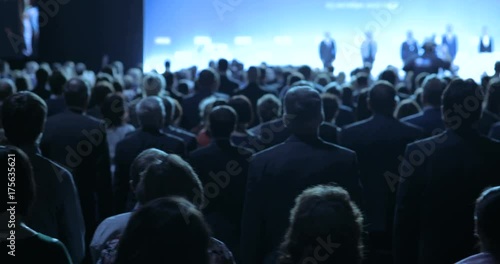 people at a conference or presentation, workshop, master class photograph. Back view