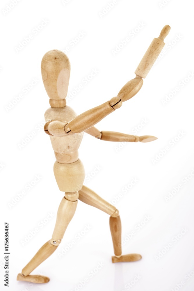 Wooden jointed figure with a rolling pin Wooden jointed figure with a rolling pin