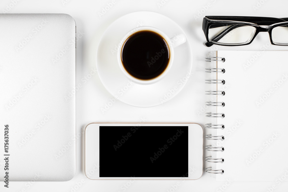 Office table with smartphone and other items Office table with smartphone and other items