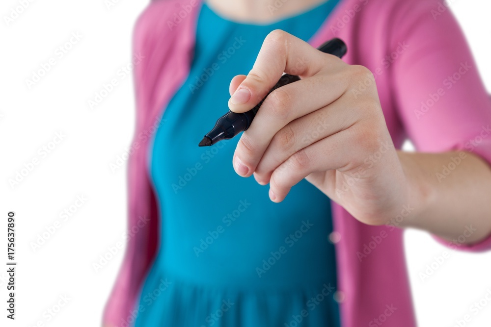 Fototapeta premium Teenage girl pretending to write on invisible screen