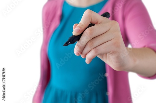Teenage girl pretending to write on invisible screen