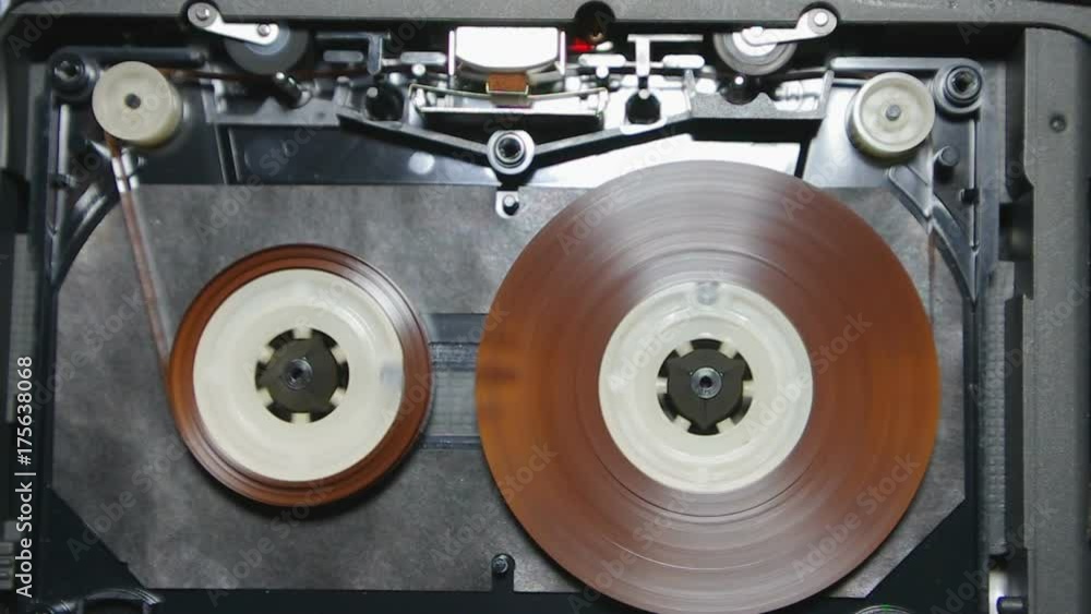 The audio cassette turns on on is reproduced in a player The audio cassette turns on on is reproduced in a player