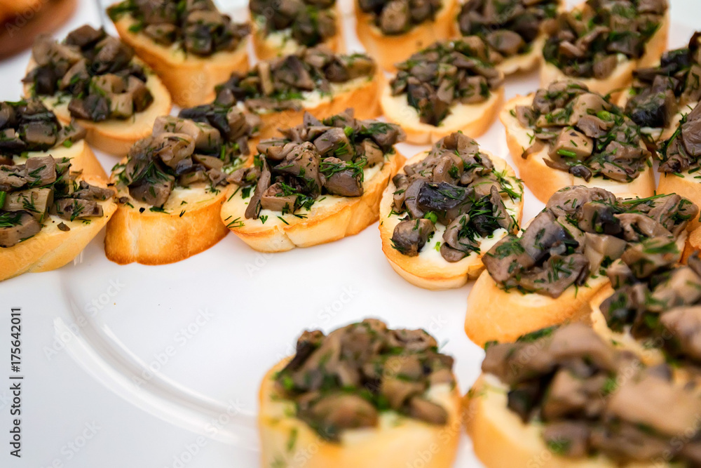 Close up bruschetta with fried mushrooms Close up bruschetta with fried mushrooms