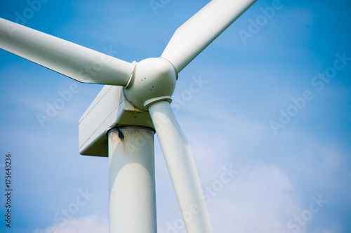 Closeup of the generator unit on a Wind turbine on a Windfarm photo