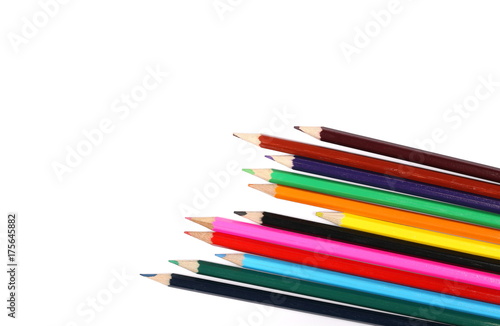 Color pencils isolated on white, top view