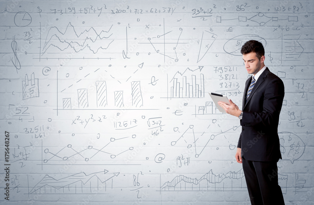 Salesman standing with drawn graph charts Salesman standing with drawn graph charts