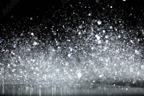 Sparkling glittering lights abstract background © Leigh Prather