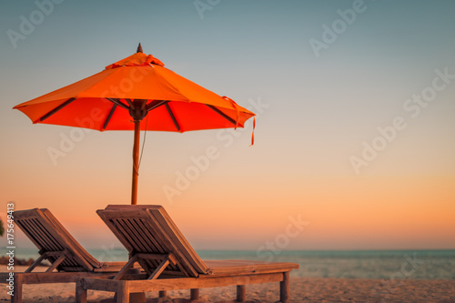 Beautiful beach. Chairs on the sandy beach near the sea. Summer holiday and vacation concept. Inspirational tropical scene. Tranquil scenery, relaxing tropical landscape design