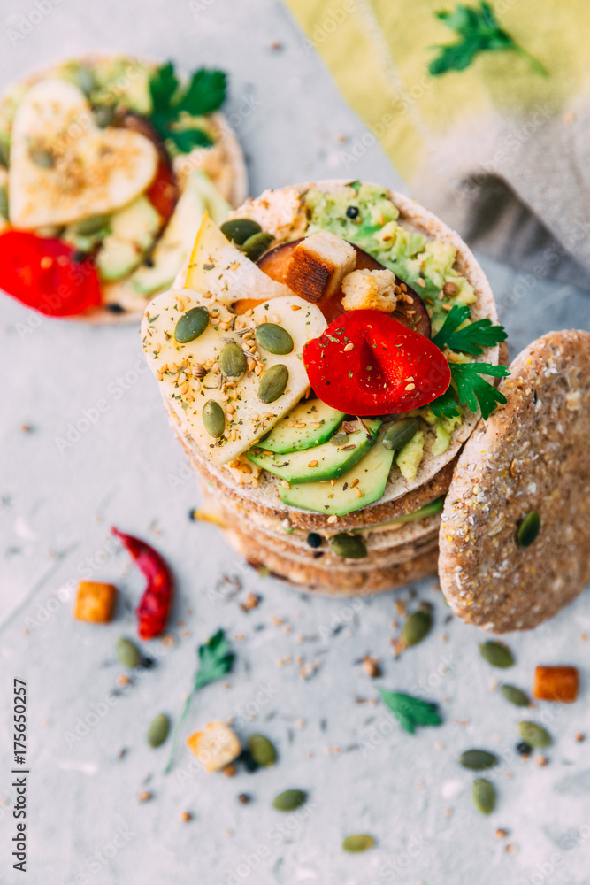 Healthy vegetable sandwich with vegetables on a light background
