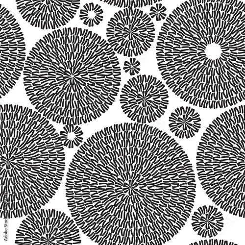 Embroidery Seamless Pattern Ornament with Black Circles on a White Background...