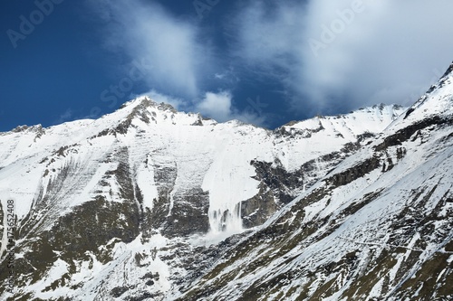 alps peaks with avalanche,Hochgebirgsstausee, Barrier lake Kaprun, photo