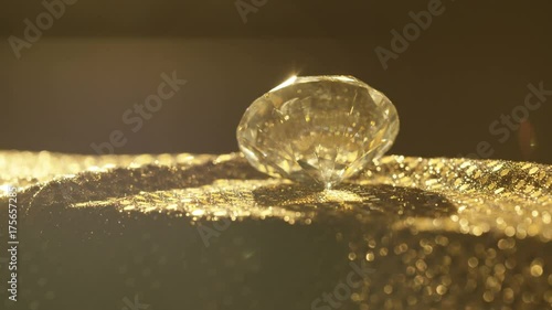 Large faceted diamond on shimmering rotating stand, wealth and luxury concept photo