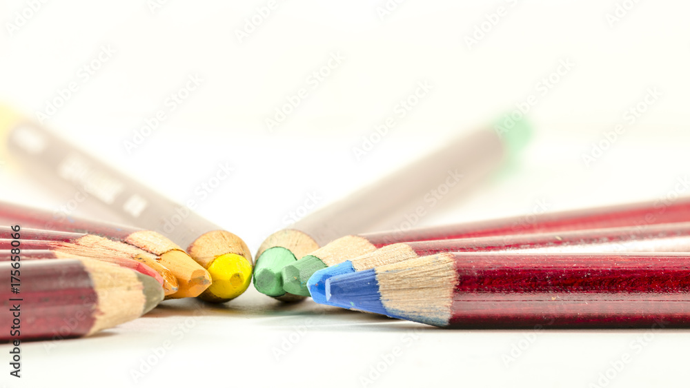 Fototapeta premium the coloured pencils, frontal view of colored pencil grouped together