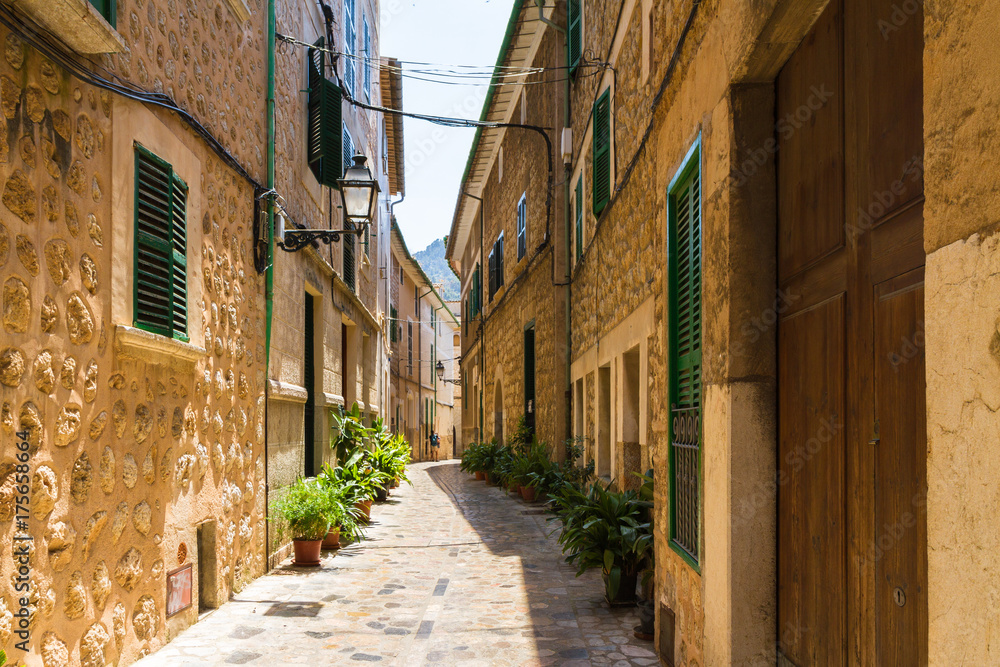 Cobbled stone narrow street at Soller village, Majorca, Spain