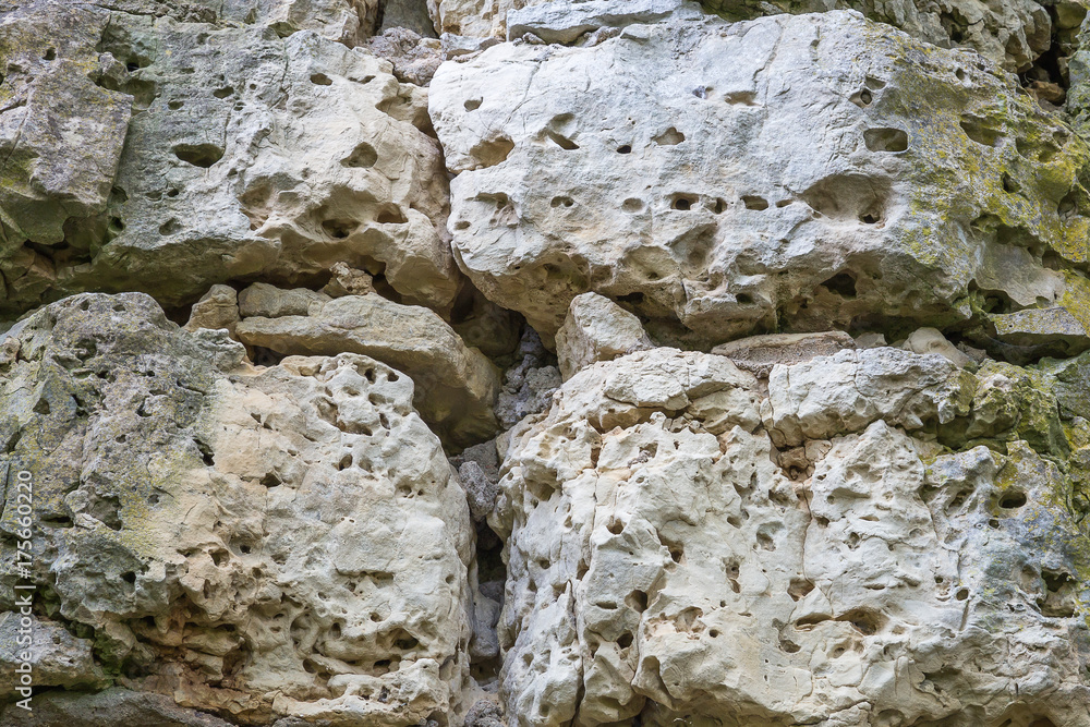 Fragment of an old wall from dolomite close up