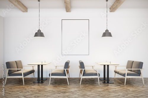 White cafe interior, gray sofas, poster © ImageFlow