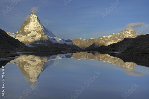 Matterhorn reflected in the Riffelsee, Zermatt, Valais, Switzerland, Europe