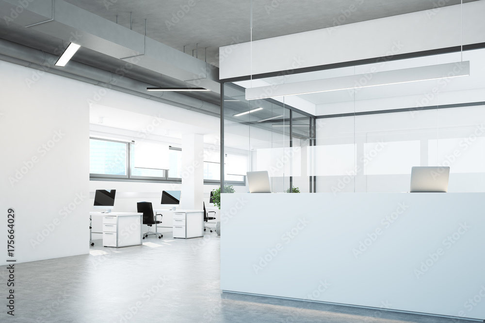 White reception in a white and glass office White reception in a white and glass office