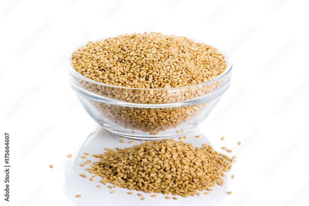 sesame placed in a bowl on a white background