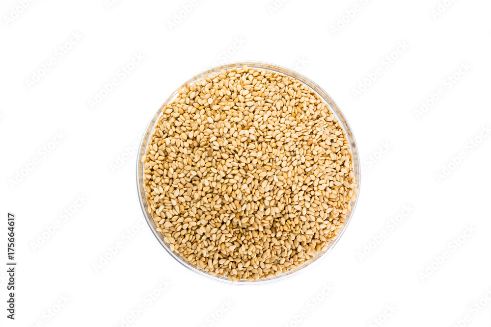 sesame placed in a bowl on a white background sesame placed in a bowl on a white background