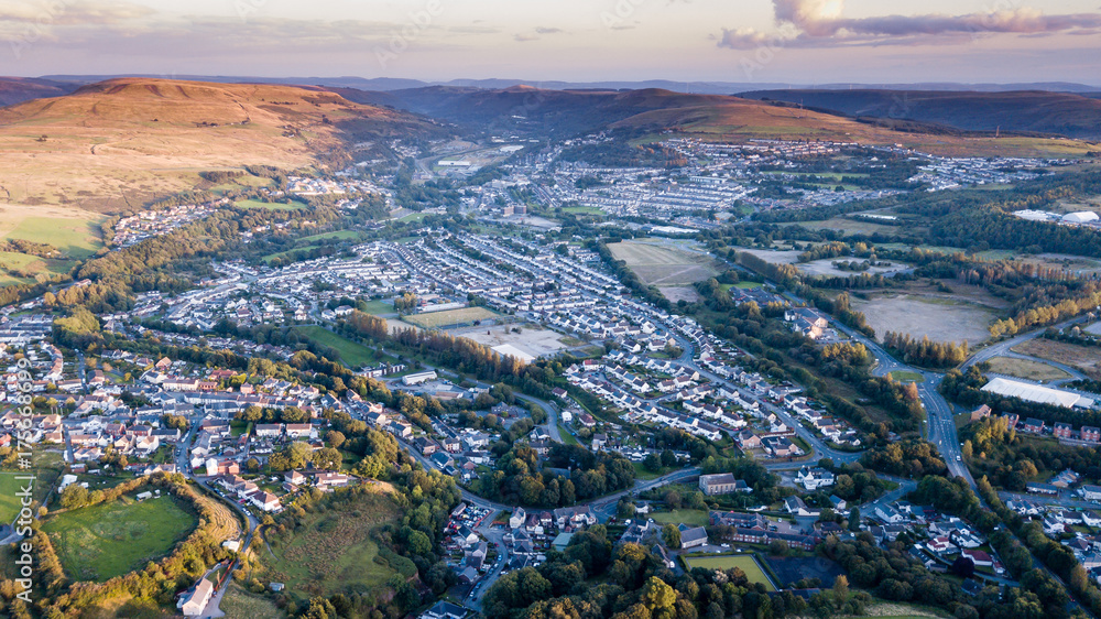 Aerial view of a South Wales valley town at sunset