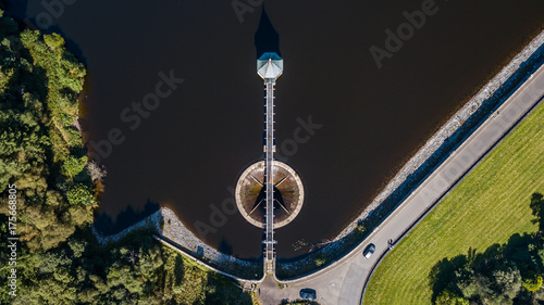 Aerial view looking directly down the spillway of a reservoir photo