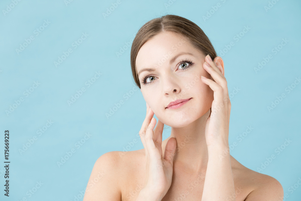portrait of attractive woman beauty image on blue background portrait of attractive woman beauty image on blue background