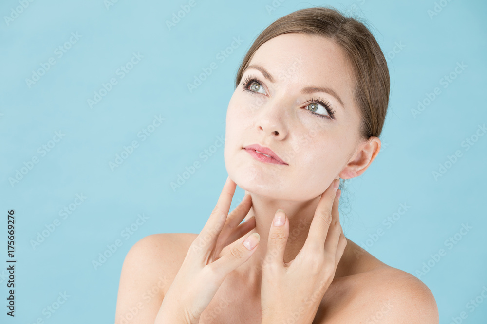 portrait of attractive woman beauty image on blue background portrait of attractive woman beauty image on blue background