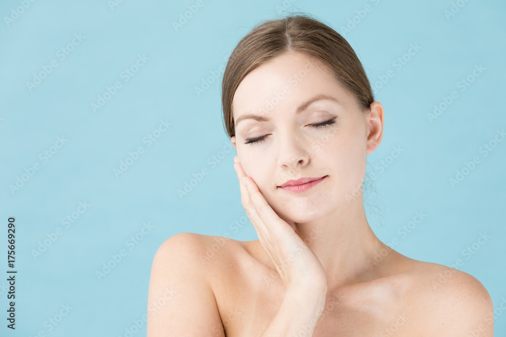 portrait of attractive woman beauty image on blue background portrait of attractive woman beauty image on blue background