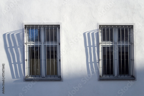 Barred windows with shadows © imageBROKER