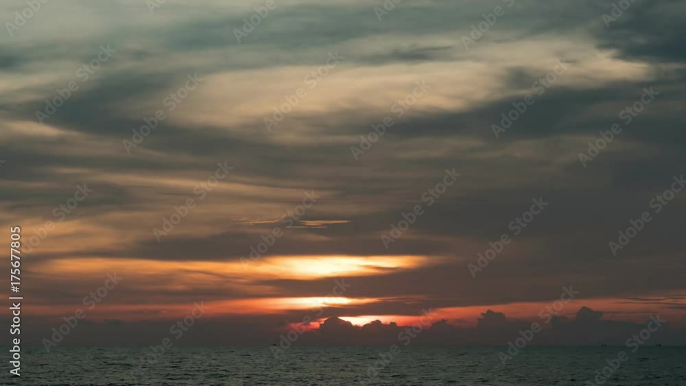 Beautiful sunrise or sunset over tropical sea in phuket thailand Beautiful sunrise or sunset over tropical sea in phuket thailand