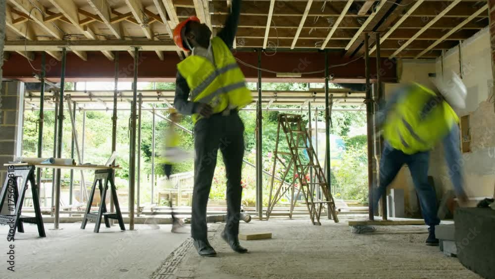 Time lapse of busy construction team working together on building site