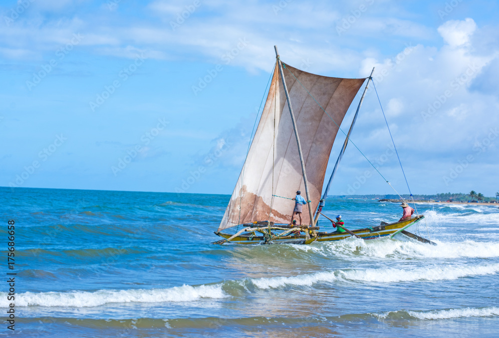 Fototapeta premium Sri Lankan traditional fishing catamarans in Negombo, Sri Lanka. Negombo is known for its centuries old fishing industry & long sandy beaches