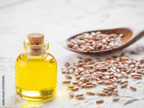 Brown flax seeds and flaxseed oil close up