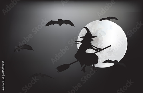 Witch flying on a broom on a full moon
