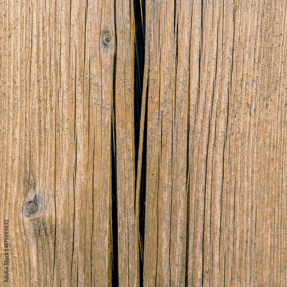 Board from a fir-tree with a crack. Close up. Board from a fir-tree with a crack. Close up.