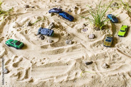 Racing cars on the sand compete in the game. photo