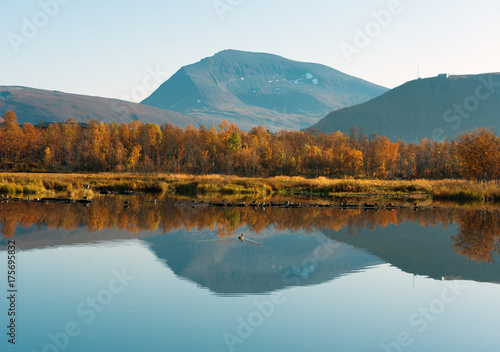 The beautiful lake in autumn paints. Tromso. Prestvann 