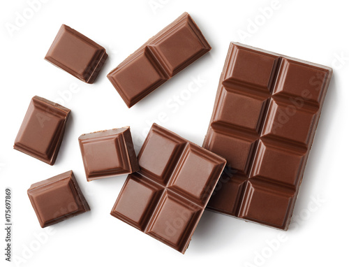 Valokuva Milk chocolate pieces isolated on white background