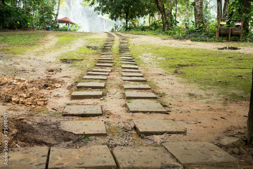 Walkway collapsed in the garden of Kuang Si Waterfalls Luang Prabang , Laos