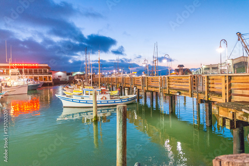 SAN FRANCISCO - AUGUST 6, 2017: Beautiful view of Fishermen Wharf port. The city attracts 20 million people annually photo