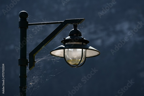 Spiders Web Attached to a Lamppost in Hallstatt photo