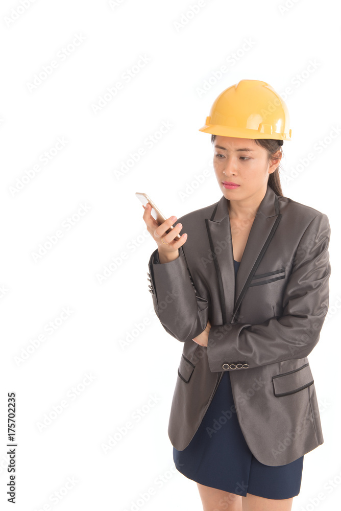 Portrait of asian business woman engineer holding thumb up and use smartphone isolated on white background. Free form copy space. Portrait of asian business woman engineer holding thumb up and use smartphone isolated on white background. Free form copy space.