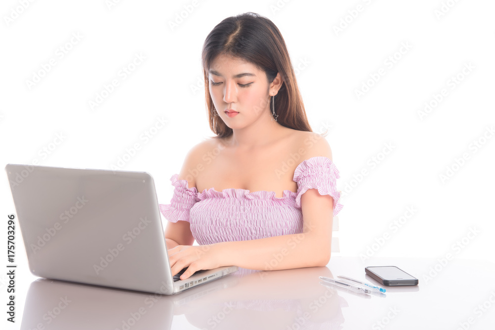 Portrait of beautiful young woman using laptop computer on white background. Portrait of beautiful young woman using laptop computer on white background.