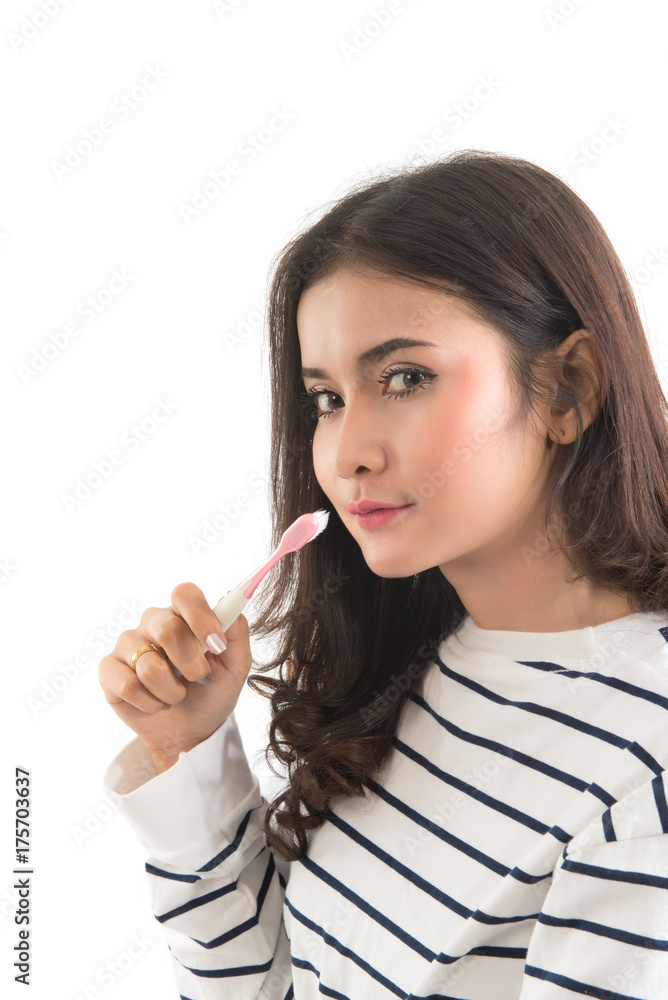 Woman hand holding a toothbrush, isolated on a white background, This image for healthcare concept. Woman hand holding a toothbrush, isolated on a white background, This image for healthcare concept.