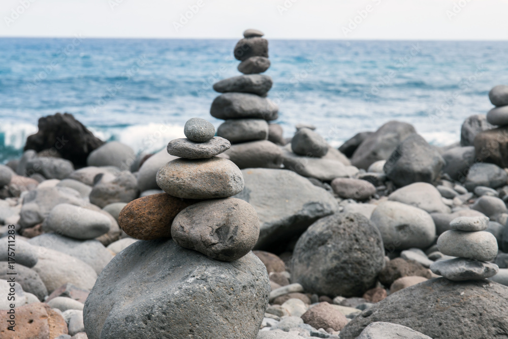 Balanced stones on beach